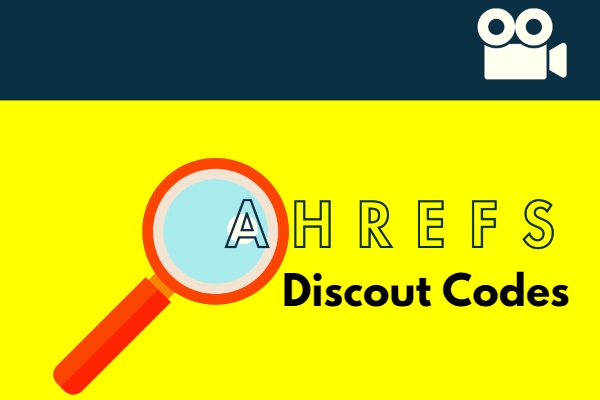 A laptop screen displaying the Ahrefs website